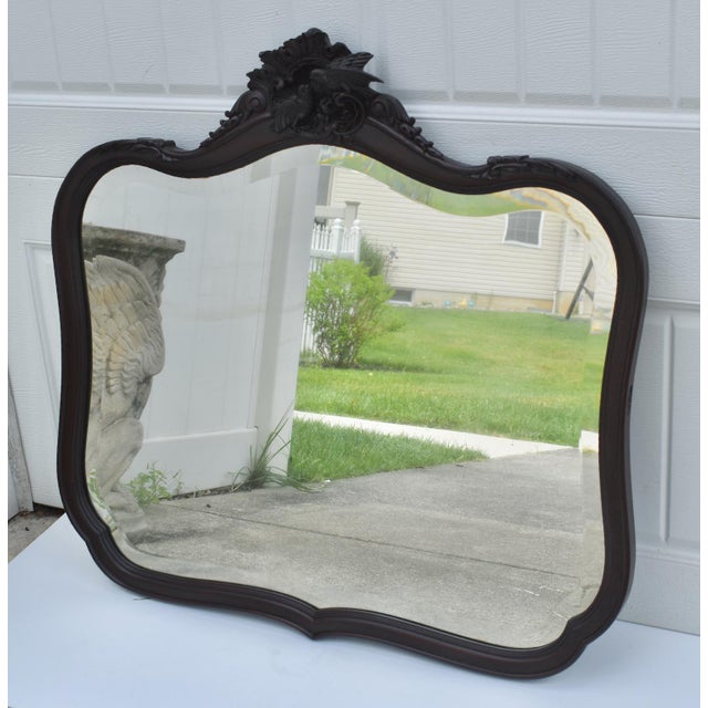 Antique (1890's) Wall Mirror has a Victorian Style. Wood Frame. Mahogany. Oval in Shape, Beveled Glass, Love Bird...