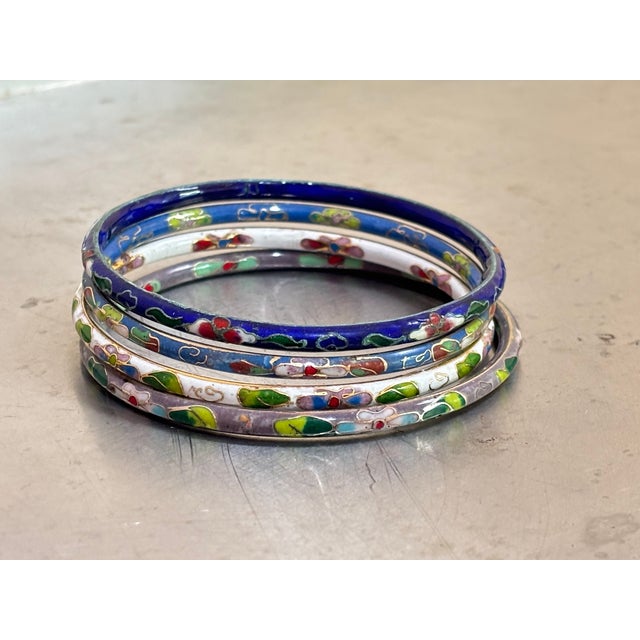 1930s enamel on brass cloisonne' bangle bracelets; set of 4. Excellent condition.