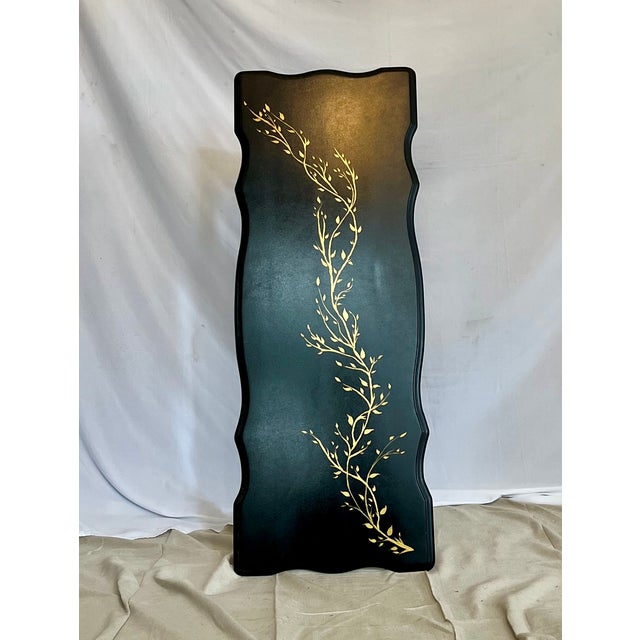 Our local Russian refugee artist designed and painted this striking coffee table, and her skilled husband this design into...