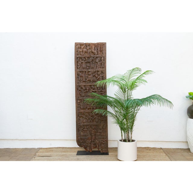Attributed to the early 20th century (circa 1910s–1930s), this monumental 7-foot architectural palace door (Ilekun Afin)...