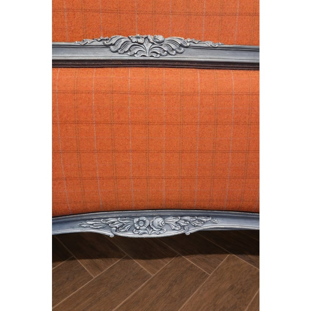 Striking French Louis XV–style King bed featuring a beautifully carved wood frame in a distressed blue-gray finish with...