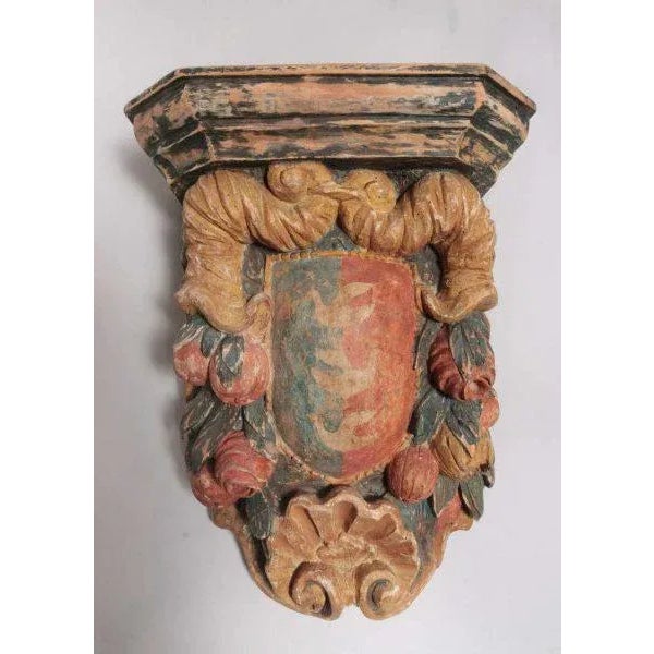 Beautifully carved and colored Italian Baroque polychrome pine bracket. The colors are faded and the carving is very nice.