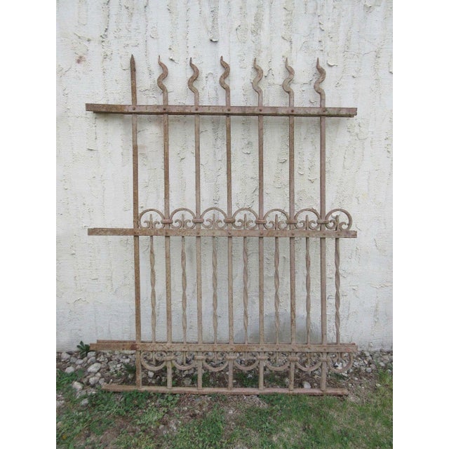 This antique Victorian iron gate is a wonderful piece of architecture. Heavy, tight, and sturdy. Piece does show signs of...