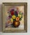 1940’s vintage, brightly colored, floral still life oil painting on canvas. In vintage, white washed ornate wood frame....