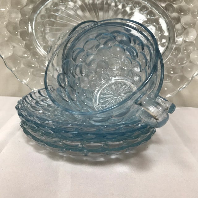Vintage, blue bubble glass ware from the forties by Anchor Hocking Glass in captivating, sapphire blue. The pictures don't...