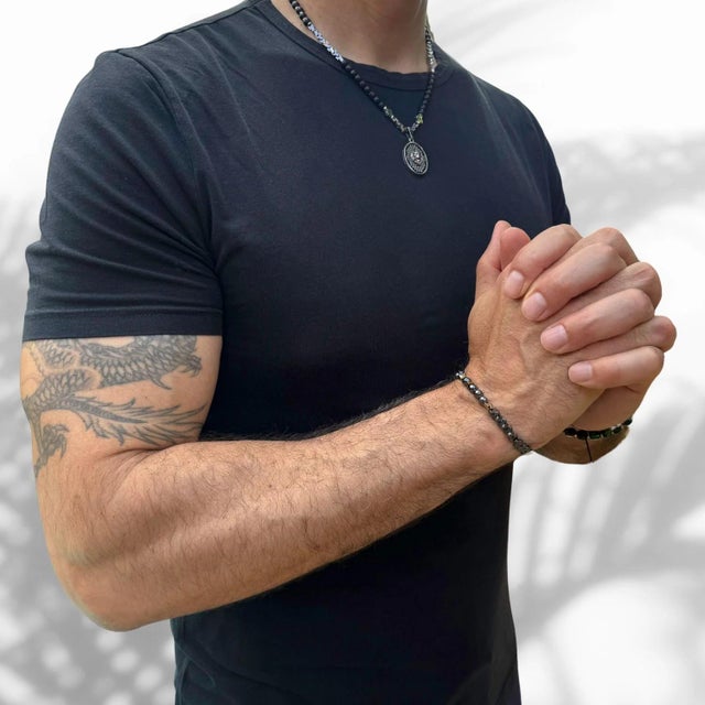 Designed with the unique fashion-forward man in mind, the Positive Vibration Hematite Stone Men's Bracelet. The natural...