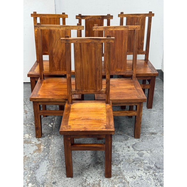 Design Plus Gallery presents a Set of Six Handcrafted Dining Chairs. This matching set is built from solid wood and shows...