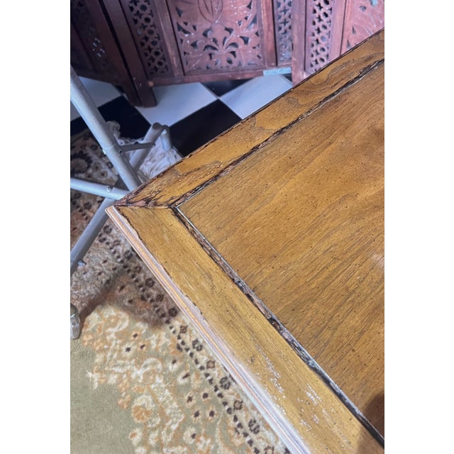 Vintage mid century side table or nightstand from Drexel. This classic Spanish Revival style table features one drawer...