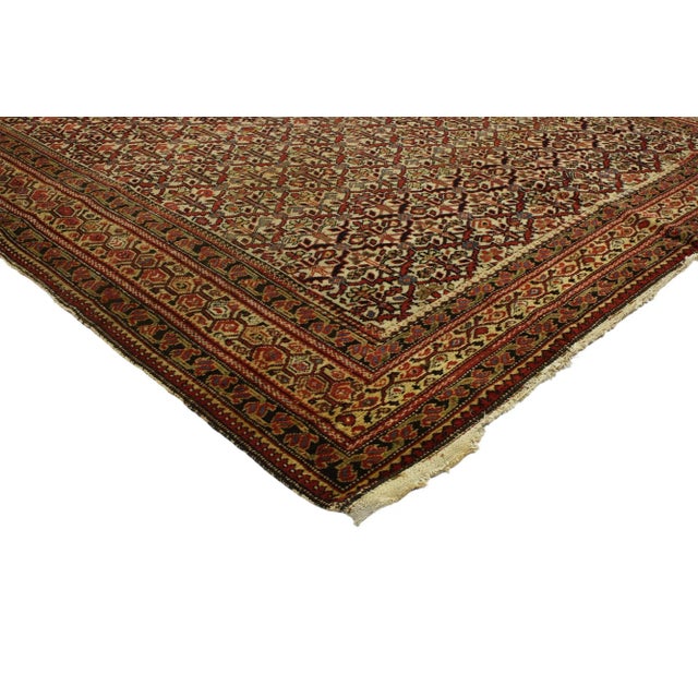 76694 Distressed Antique Malayer Persian Rug, 05'06 x 09'04. This stunning hand-knotted wool antique Persian Malayer rug...