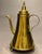19th century Dutch coffee pot in brass. Handmade with three delicate turned legs and elegant lines, the form features a...