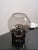 Beautiful table lamp by Sussmuth Leuchten. Germany, 1970s. All smoked clear glass, tripod base. The lamp holder is chrome-...