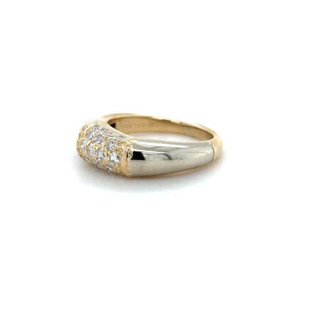 This classic ring by Van Cleef & Arpels in their Philippines Collection, is in a domed bombé style with pavé set round...