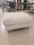 The Austin Ottoman combines sleek metal craftsmanship with tailored upholstery, creating a versatile piece that balances...