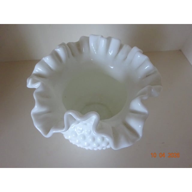 White Hobnail Milk Glass ruffled edge 6' decorative bowl that could be used as a candy dish. It was displayed on Ethan...