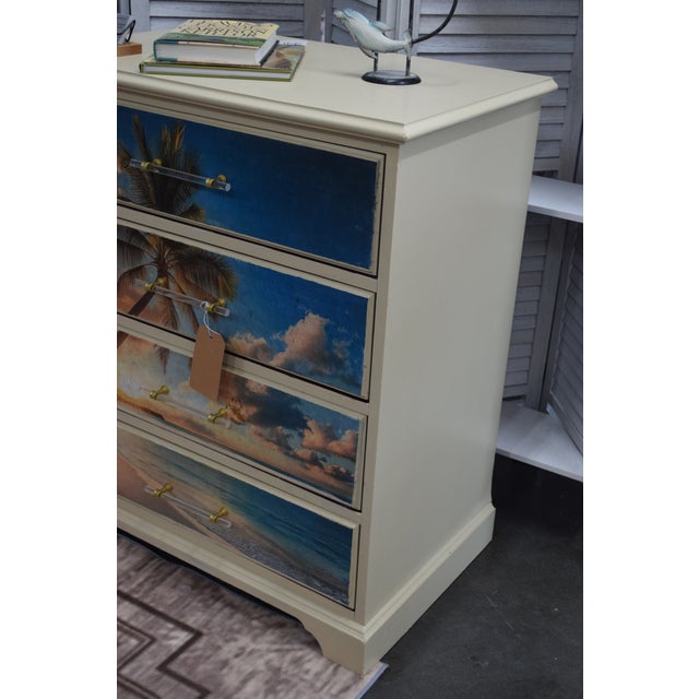Bring paradise home! This standard 4-drawer dresser has been beautifully refinished with a stunning, continuous tropical...