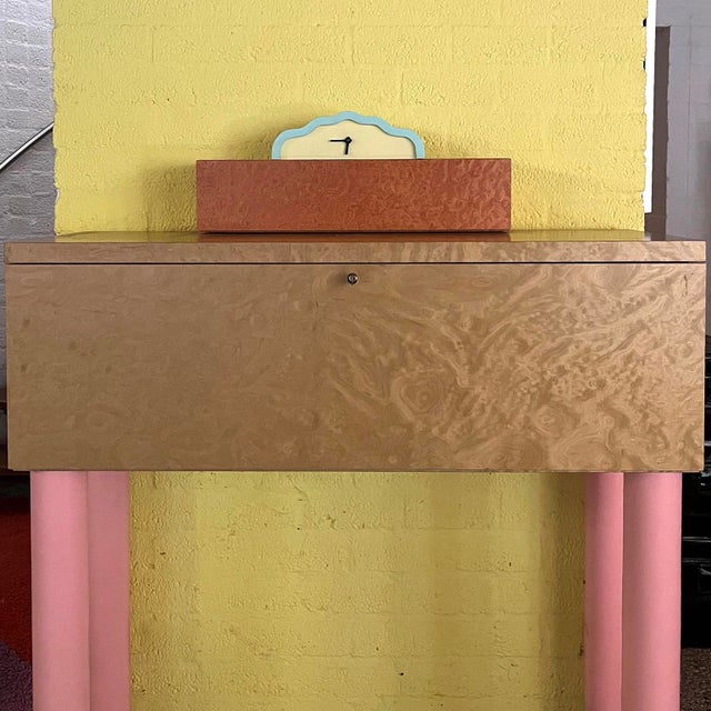 Beautiful colourful desk is executed in various types of wood. The desk has a fold-out writing area and the interior has...