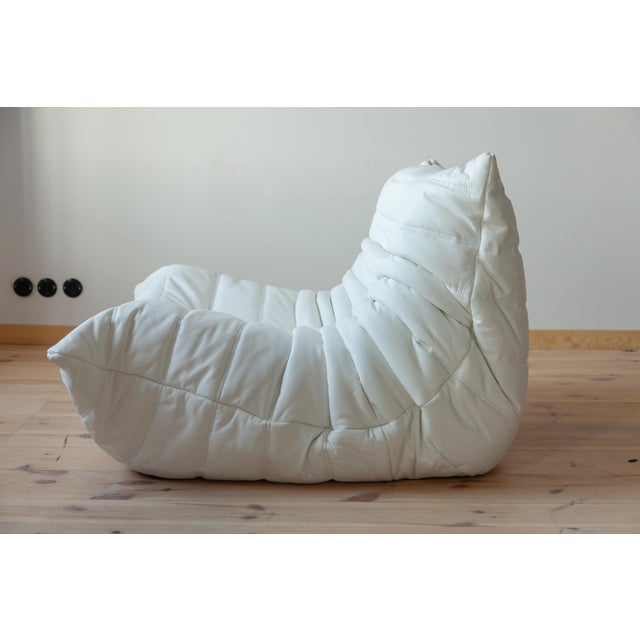 This Togo has been reupholstered with new foam and high-quality new fabric, keeping its inner structure, giving the item...