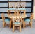 Mid 20th Century 1960s Round Rattan Dining Table With 6 Rattan Dining Chairs and 1 Wide Leaf - Set of 8 For Sale - Image 5 of 12