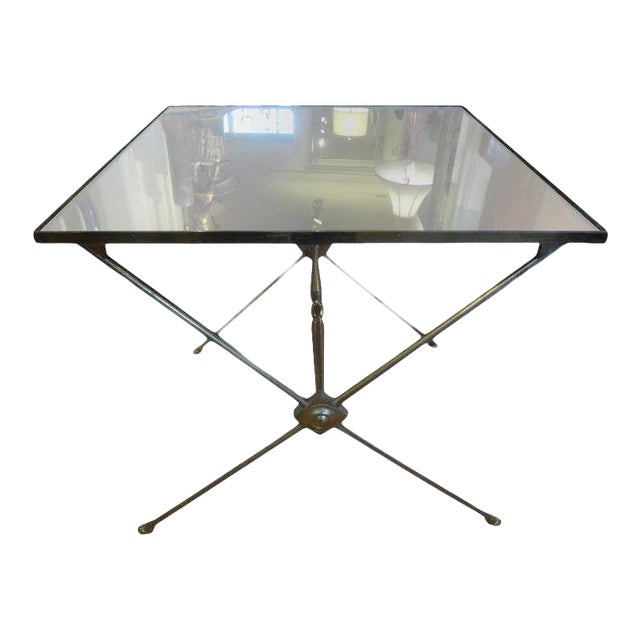 Charming square French Maison Jansen or Maison Bagues style brass/bronze gueridon. This French table with a mirrored top...