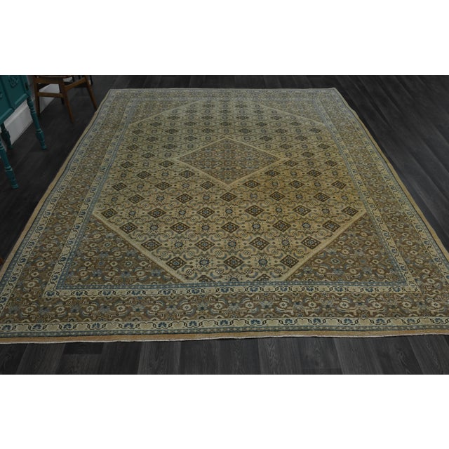 Vintage Persian Hand-Knotted area rug is a semi-antique vintage area rug. The '70s Eastern region of Anatolian's unique...