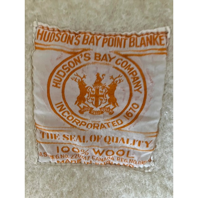 Classic Dreamy and cozy authentic mid century vintage Four Point HUDSON BAY blanket throw. Cream color wood with series of...