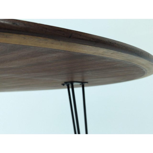 Round dining table is made from 1 inch solid oak wood paired with Mid Century Hairpin Legs. The table top is finished with...