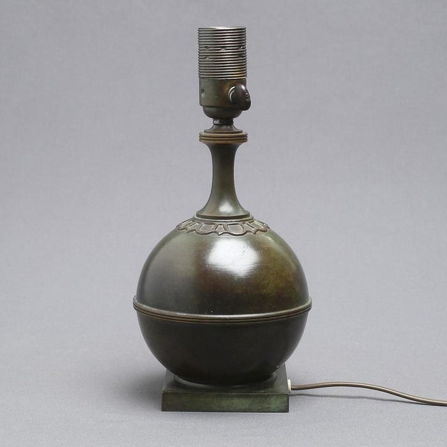 Swedish art deco table lamp produced by gab (guldsmedsaktiebolaget) during the 1930s. Finely crafted bronze body with a...