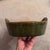 A charming vintage mid-century ceramic vegetable serving dish, featuring a rich avocado green majolica-style glaze. The...