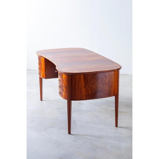 Exceptional organically shaped desk from the swedish modern era. Designed and produced by unknown cabinetmaker in sweden...