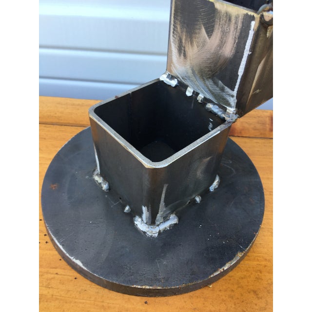 This is a vintage abstract industrial modernist hand wrought iron sculpture. This culture has a rustic iron finish. The...