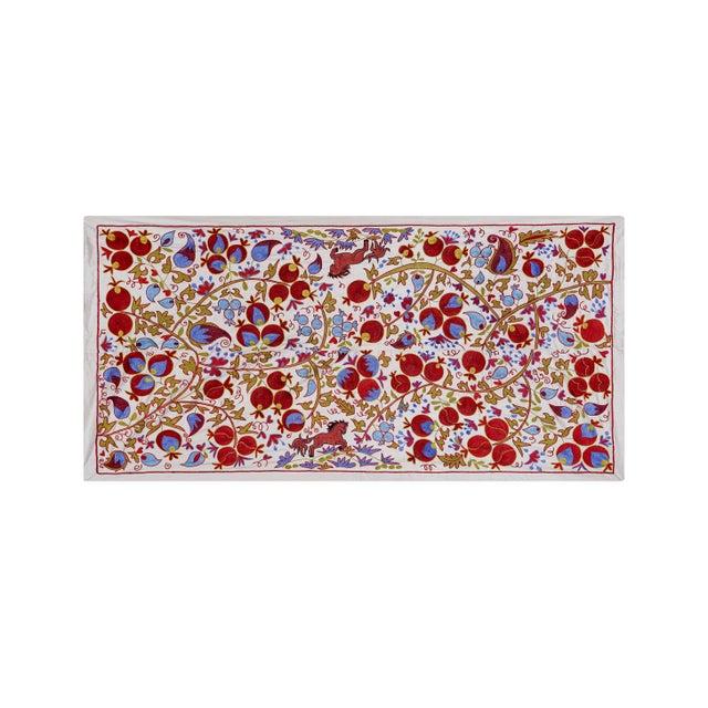 Vintage Suzani from Samarkand, circa 1900s. Dimension; 39'' x 72" inches / 98 x 184 cm / 3'2'' x 6' Material: Silk Cotton...