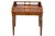 A Theodore Alexander mahogany drinks or chairside table featuring a tooled leather inset top, pierced wood gallery, single...
