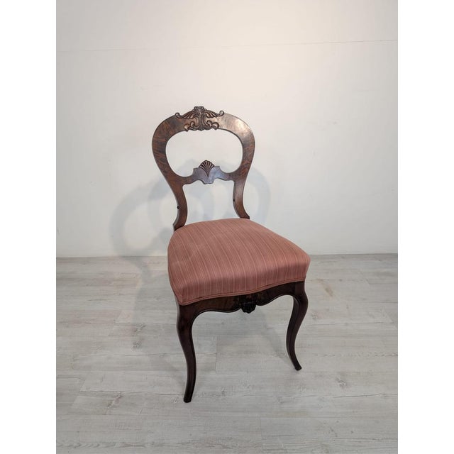 Louis XV Style Wooden Chair Stylish, wooden armchair in the Louis XV style with springs. The piece features carved wooden...