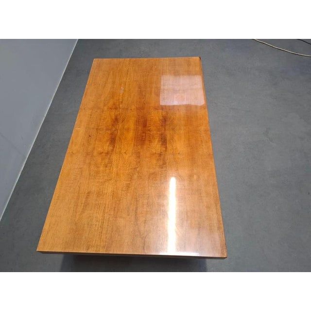 A vintage height adjustable oak table produced by ILSE Möbel, Germany, circa the 1970s. The design combines a warm oak top...