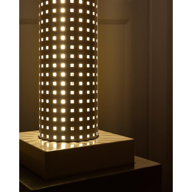 Floor lamp, designed by Matteo Thun for Bieffelplast (1985), "Chicago Tribune" model, perforated sheet steel, light-...