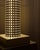 Floor lamp, designed by Matteo Thun for Bieffelplast (1985), "Chicago Tribune" model, perforated sheet steel, light-...