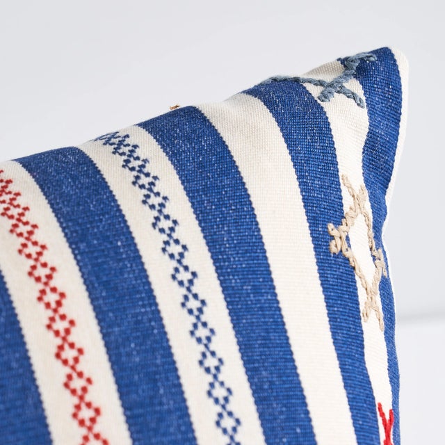 This pillow features Rhodes Stripe with a knife edge finish. Inspired by Ukrainian needlework, Rhodes Stripe is a woven...