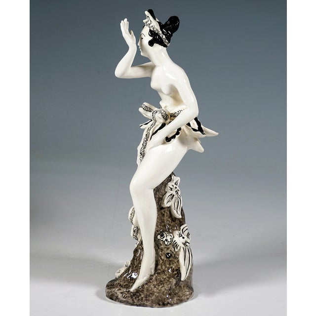 Impressive goldscheider vienna ceramic figurine of the 1920s: the young lady with artfully pinned up hair and headdress...