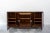 Important sideboard made of walnut and walnut root Art deco. Distributed in three bodies, the side ones with one door and...