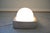 A 1970s wall or ceiling light from the dutch lighting company herda. The light is made of orange hard plastic, possibly...