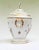 Nice pair of white porcelain lidded urns or pots in the Sevres manner Painted with colourful floral motifs and parrots We...