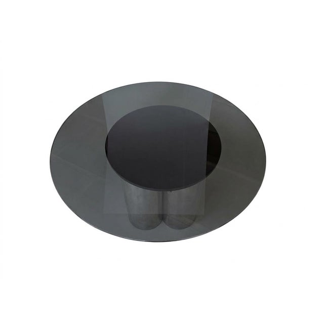 A stunning table with a modern and sophisticated design, perfect for adding a touch of elegance and character to any...