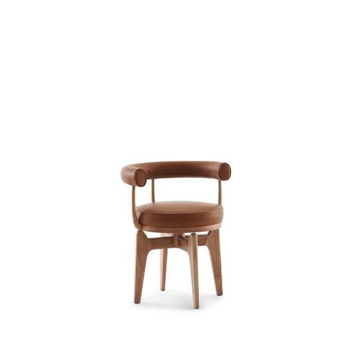 Charlotte Perriand Indochine Armchair Manufactured by Cassina in Italy This swivel armchair is a re-working of the LC7,...