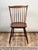 This wonderful antique step down Windsor chair dates to the early 19th century and is a classic example of the simple,...