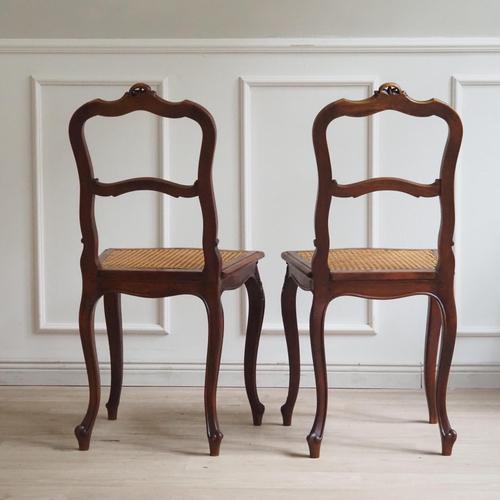 These French chairs originated around 1900 in the Rococo tradition, adopting the flowing forms of the 18th century in a...