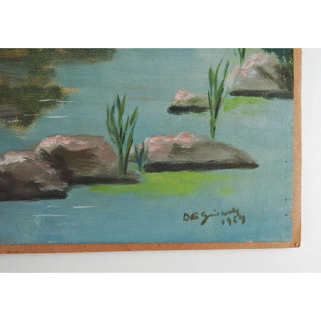 Vintage 1954 oil on canvas painting of quiet tree lined lake landscape. Signed illegibly and dated lower right corner....
