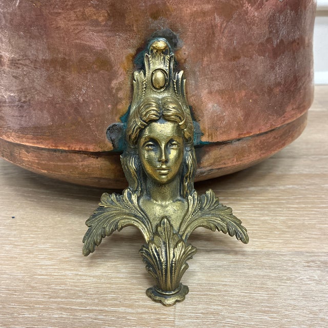 This impressive antique copper pot/cauldron is a statement piece with option for many uses. Can be used as a log bucket,...