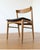 Set of four vintage Danish teak dining chairs from the 1950s. Dimensions (per chair): Width: 50 cm Depth: 52 cm Height: 73...