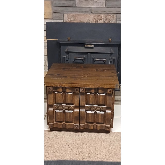 Mid-Century Modern Carved Wood Cabinet with Brass Accents This unique mid-century modern cabinet is a stunning piece that...