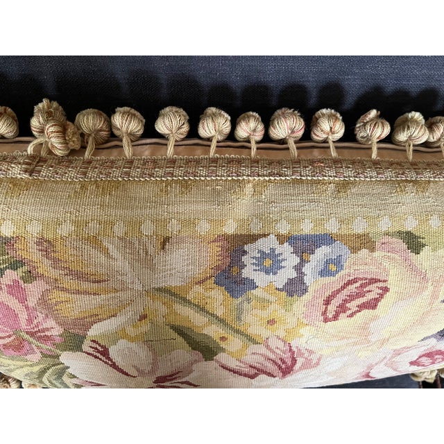Antique 18th century French Aubusson tapestry pillow with passementerie trim and ball tassel fringe. The floral panel of...